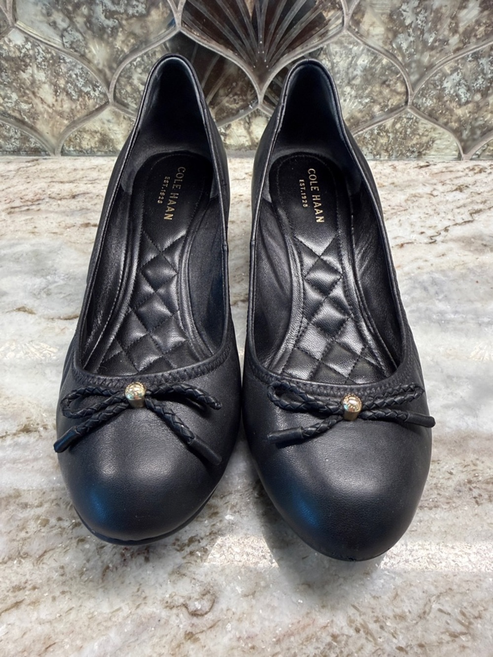 Cole Haan Tali Grand Black Leather Ballet wedge with Braided Bow and Gold Accent